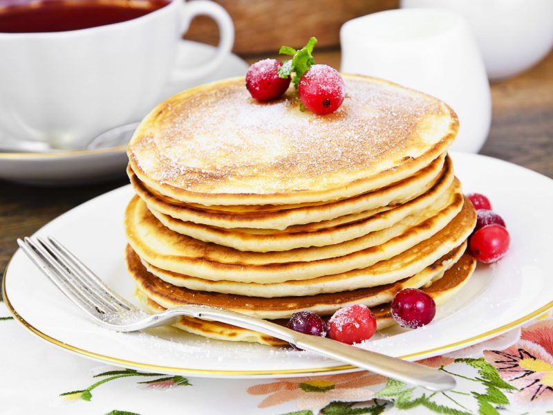Tasty Pancakes with Cranberry Stack Studio Photo